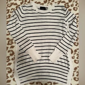 White and black striped tunic. High slits on each side.